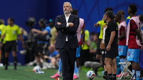Congo head coach Sebastien Desabre reacts during the World Cup round of 32 soccer match between England and Congo  