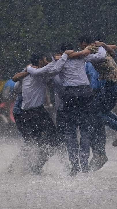 Kids playing in rain
