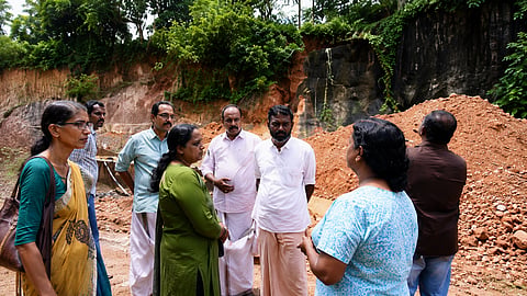 Officials inspecting the area and interacting with families in Mukkali
