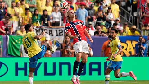 Norway's Erling Haaland (9) shoots and scores their second goal during the World Cup 