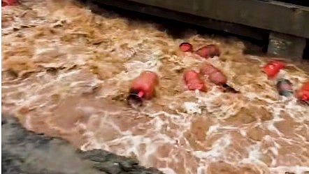 3,000 Gas Cylinders Float In River As Flood Water Breaches Plant