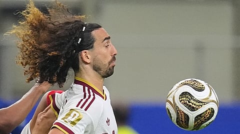 France's Michael Olise, left, and Spain's Marc Cucurella vie for the ball Michael Oliseduring a World Cup semifinal soccer match 