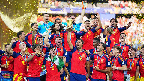 Spain celebrates with the trophy after the World Cup final soccer match between Spain and Argentina  