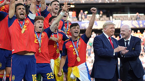 Spain players, from left, cheer alongside President Donald Trump and FIFA President Gianni Infantino at the conclusion of the World Cup