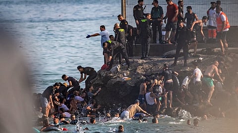 57 Dead, 60,000 Enter From Morocco