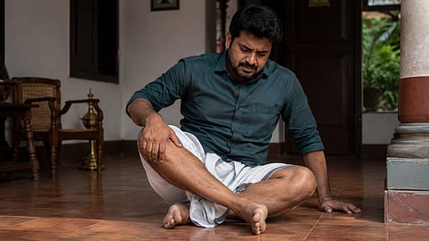Sitting cross legs on floor