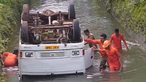 School bus overturns
