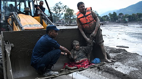 Kept Her Head Above Water: How A 91-Year-Old Became Face Of Survival in Nepal