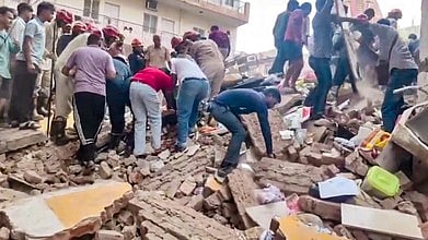 Rescue operation underway after a building collapsed at Satya Niketan area, in New Delh