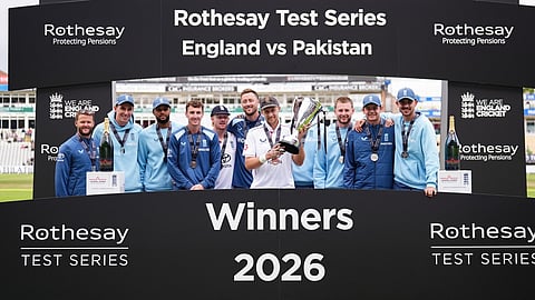 england cricket team with trophy