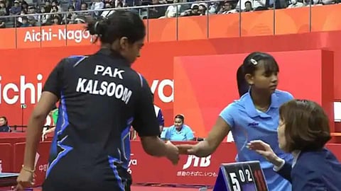 Syndrela Das shaking hands with Pakistani counterpart at 2026 Asian Games