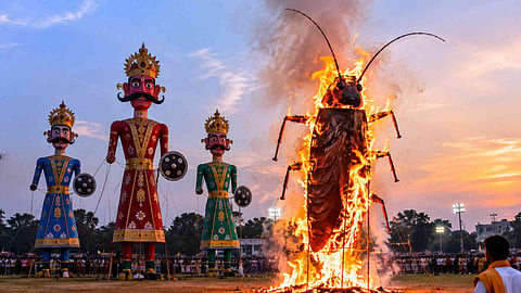 Dussehra Effigies Beneath a Fiery Sunset