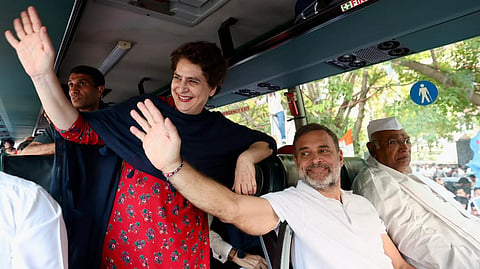 Congress President Mallikarjun Kharge, party leader Rahul Gandhi and other members of the INDIA bloc move in a bus 