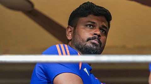 India's Sanju Samson at pavilion after rain delayed toss for the fifth T2oI cricket match of a series between India and West Indies 