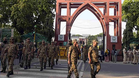 Security personnel keep vigil as students of Jamia Millia Islamia Law Department took out a peaceful 'black coat' march, in New Delhi, on October 22