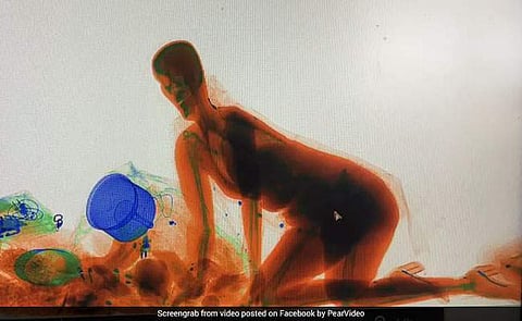 ബാഗ് കളവുപോകാതിരിക്കാന്‍ റെയില്‍വേ സ്റ്റേഷനിലെ എക്‌സ്‌ റേ മെഷീനില്‍ ചാടിക്കയറി യുവതി; വീഡിയോ വൈറല്‍