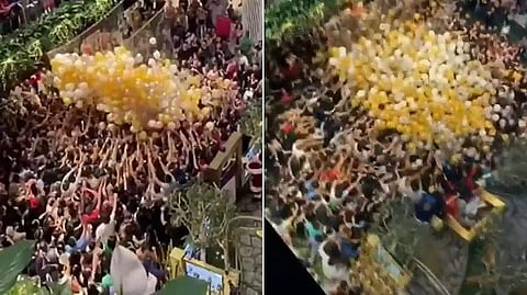ബലൂണില്‍ പറന്നുവരുന്നത് ക്രിസ്മസ് ബംപര്‍; ആയിരങ്ങള്‍ ഓടിക്കൂടി; നിരവധി പേര്‍ക്ക് പരിക്ക്; അമളി (വീഡിയോ)