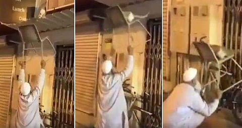 കെട്ടിടത്തിന് മുകളില്‍ കുടുങ്ങിയ പൂച്ചയ്ക്ക് രക്ഷകനായി വൃദ്ധന്‍; 'ചച്ചാജി'യുടെ സഹജീവി സ്‌നേഹത്തെ അഭിനന്ദിച്ച് സോഷ്യല്‍ മീഡിയ (വീഡിയോ)