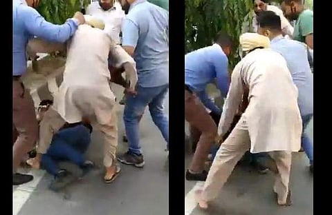 കൊള്ള നടത്തി രക്ഷപ്പെട്ട സംഘം ആള്‍ക്കൂട്ടത്തെ കണ്ടു പേടിച്ചു, ബൈക്ക് പാളി, രണ്ടു പേര്‍ റോഡില്‍; അടിയോടടി- വിഡിയോ