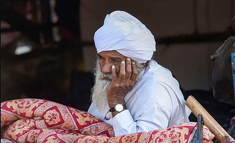 ഡല്‍ഹിയില്‍ സമരത്തിന് എത്തിയ കര്‍ഷകന്‍/ പിടിഐ