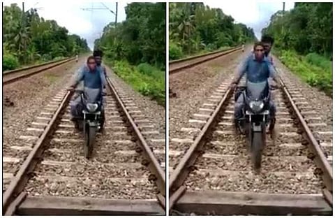 കണ്ടെയ്ന്‍മെന്റ് സോണില്‍ നിന്ന് പുറത്തുകടക്കാന്‍ റെയില്‍വെ ട്രാക്കിലൂടെ ബൈക്ക് യാത്ര; ഒടുവില്‍ സംഭവിച്ചത് (വീഡിയോ)