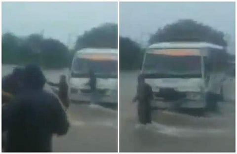 കുത്തിയൊലിച്ച് വെള്ളം; കുടുങ്ങിയ ബസ്സിനെ കെട്ടിവലിച്ച് രക്ഷാപ്രവര്‍ത്തനം (വീഡിയോ)