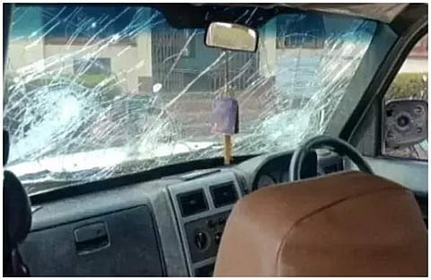 അക്രമികള്‍ അടിച്ചുതകര്‍ത്ത പിജുഷ് ബിശ്വാസിന്റെ കാര്‍