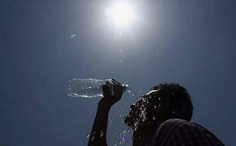 a man drinking water
