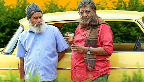 ഓറഞ്ച് മരങ്ങളുടെ വീട്ടിൽ എന്ന ചിത്രത്തിൽ ബാലചന്ദ്രനും നെടുമുടി വേണുവും/ ഫേയേസ്ബുക്ക്