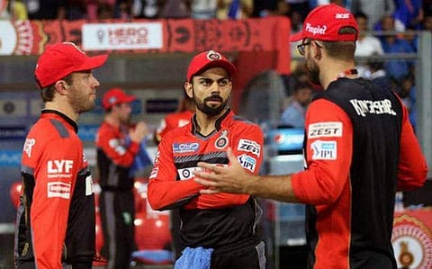 വെട്ടോറി, കോഹ് ലി, ഡിവില്ലിയേഴ്സ്/ഫയൽ ചിത്രം
