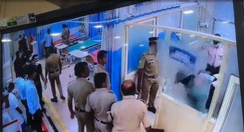 തലകൊണ്ട് ചില്ലടിച്ച് തകര്‍ക്കുന്ന കഞ്ചാവ് കേസ് പ്രതി
