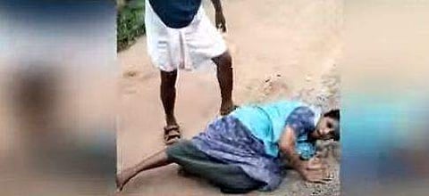 യുവതിയെ മര്‍ദ്ദിക്കുന്നതിന്റെ വീഡിയോ ദൃശ്യത്തില്‍ നിന്ന്