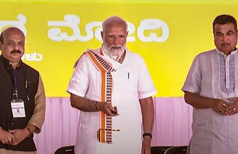 നരേന്ദ്ര മോദി, നിതിൻ ​ഗഡ്​കരി, ബസവരാജ് ബൊമ്മെ / ചിത്രം പിടിഐ