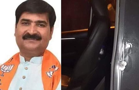 രാജു ഝാ, വെടിയുണ്ട തറച്ച കാര്‍/ എഎന്‍ഐ