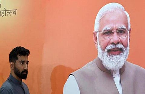 അനില്‍ ആന്റണി, നരേന്ദ്രമോദി/ ചിത്രം: ന്യൂ ഇന്‍ഡ്യന്‍ എക്‌സ്പ്രസ്‌