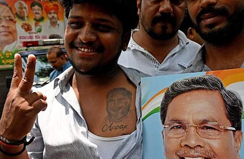 സിദ്ധരാമയ്യക്ക് വേണ്ടി പ്രകടനം നടത്തുന്ന കോണ്‍ഗ്രസ് പ്രവര്‍ത്തകര്‍/ എക്‌സ്പ്രസ്