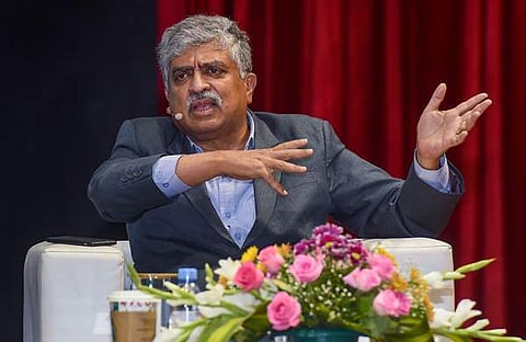 നന്ദന്‍ നിലേക്കനി, പിടിഐ