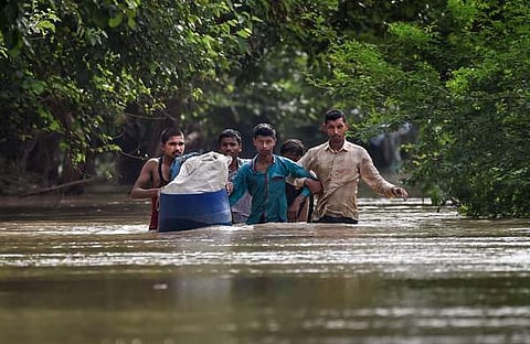 ഡല്‍ഹിയില്‍ താഴ്ന്ന പ്രദേശങ്ങളില്‍ വെള്ളം കയറിയപ്പോള്‍, പിടിഐ