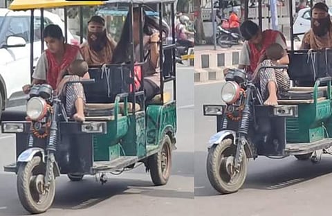 കുഞ്ഞിനെയും കൊണ്ട് ഓട്ടോ ഓടിക്കുന്ന യുവതി/ ഇൻസ്റ്റ​ഗ്രാം വിഡിയോ