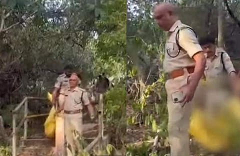 കുട്ടിയുടെ മൃതദേ​ഹം ആശുപത്രിയിലേക്ക് മാറ്റുന്നു/ എക്സ്പ്രസ് ഫോട്ടോ