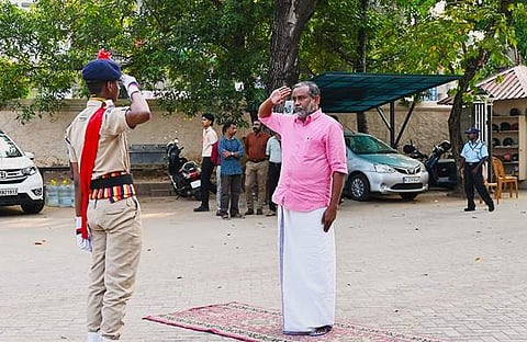 മന്ത്രി പി പ്രസാദിന് മകൻ സല്യൂട്ട് നൽകുന്നു/ ഫെയ്‌സ്‌ബുക്ക്