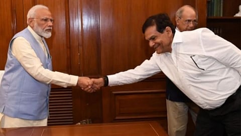 Narendra Modi and A K Mishra 