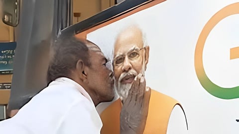 Farmer Kisses PM Modi's Pic Karnataka  