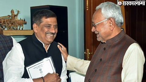 Nitish Kumar and Sanjay Jha