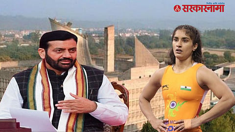 Olympic wrestler Vinesh Phogat with Haryana officials during the felicitation ceremony where she chose her preferred reward from the government's offered options.

