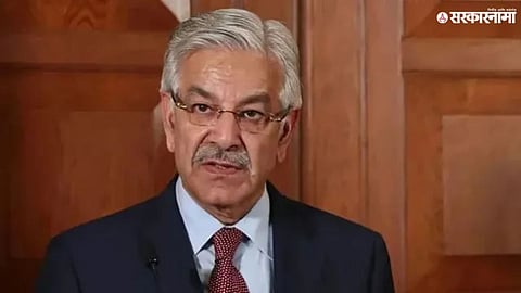 Pakistan Defence Minister Khawaja Asif displays social media photos allegedly showing five Indian jets shot down.

