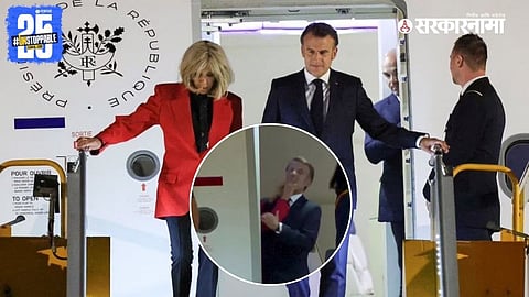 French President Emmanuel Macron and First Lady Brigitte Macron during their arrival in Hanoi, Vietnam, where a light-hearted moment between the couple was captured on camera.
