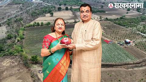 Farmer Kanchan Gadkari holding a giant 1 kg onion from her experimental farm, where she produced 13 tons per acre using an innovative method.

