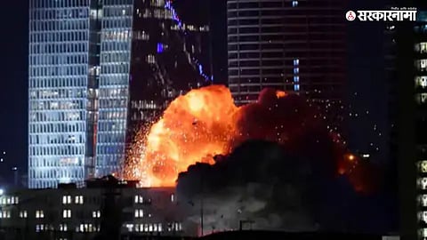 Israeli air defense intercepts Iranian missiles over Tel Aviv amid sudden late-night attack.

