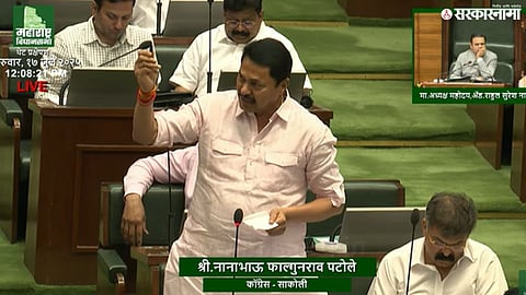 Nana Patole holds up pen drive in Maharashtra Assembly